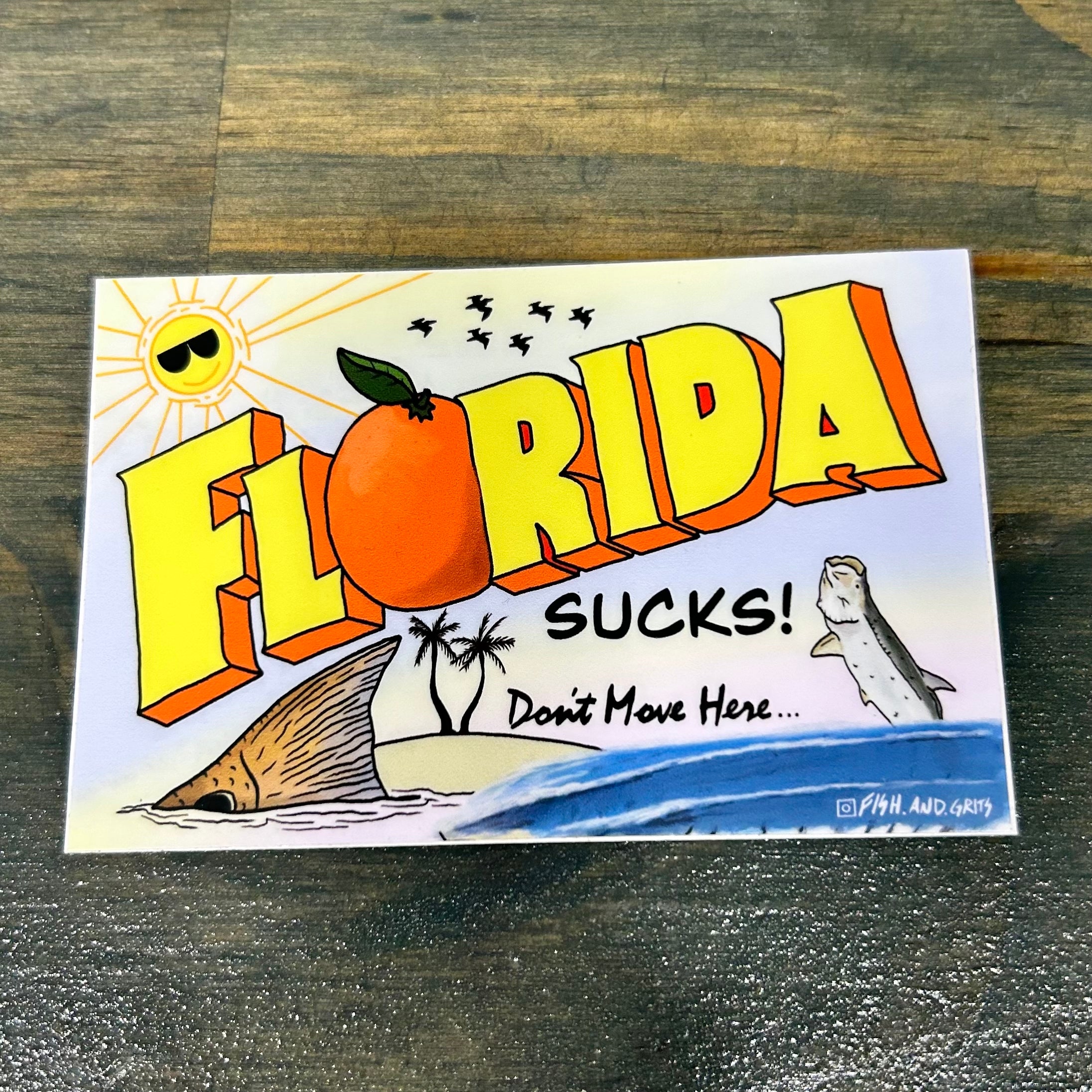 Fish and Grits “Florida sucks” sticker